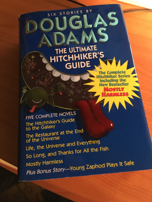 Photograph of book titles "The Ultimate Hitchhiker's Guide: six stories by Douglas Adams"